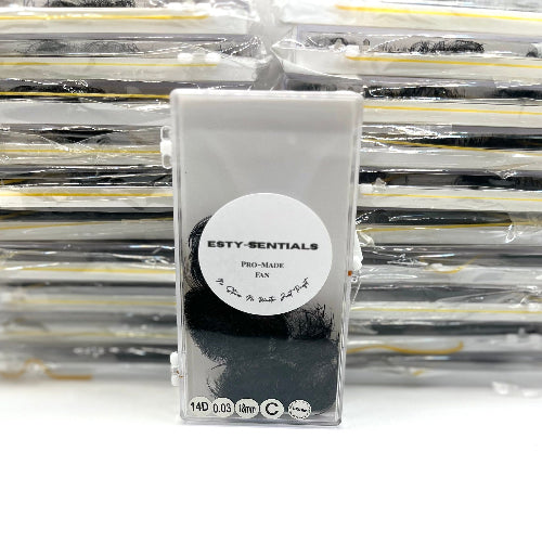 Packaged false eyelashes with 'Esty-Sentials' branding on a white background