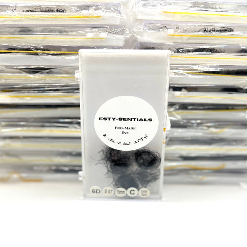 Packaged product with 'ESTY-SENTIALS' label on a white background