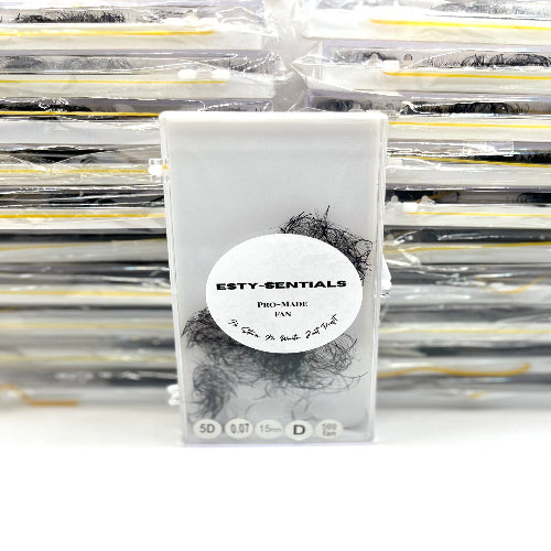 Packaged eyelash extensions with 'ESTY-SENTIALS' branding on a white background